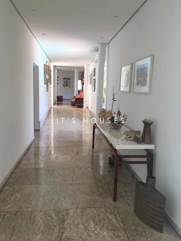 Sala de estar casa à venda em Tambore 3, Alphaville, Santana de Parnaíba — 5 suítes, 1200 m² — imagem 2 de 27