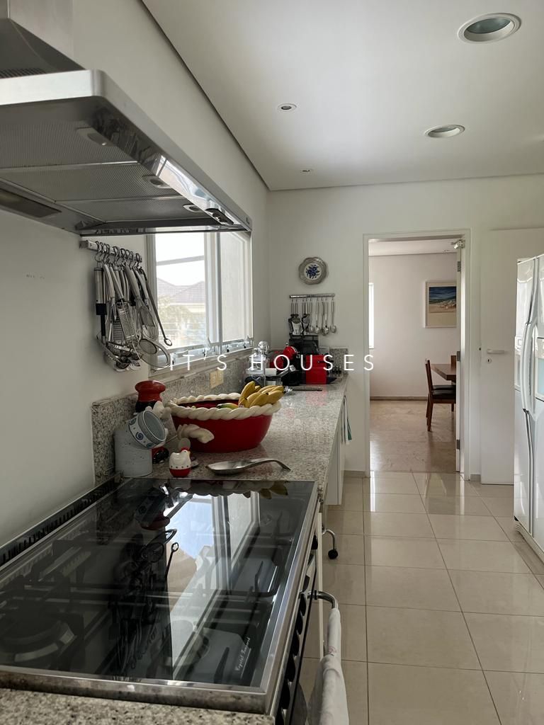 Cozinha e área gourmet casa à venda em Tambore 3, Alphaville, Santana de Parnaíba — 5 suítes, 1200 m² — imagem 3 de 27