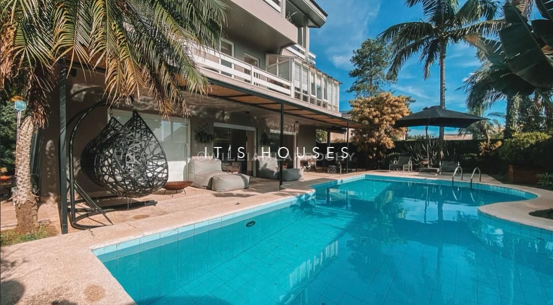 Fachada casa à venda em Alphaville Residencial 12, Alphaville, Santana de Parnaíba — 3 suítes, 500 m² — imagem 1 de 14